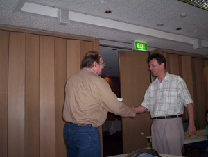 Dejan Antic wins the 2004 Gosford Open - Keith Farell (left) President of the club